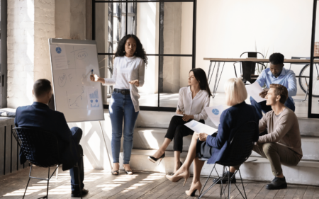 Black female researchers sharing findings