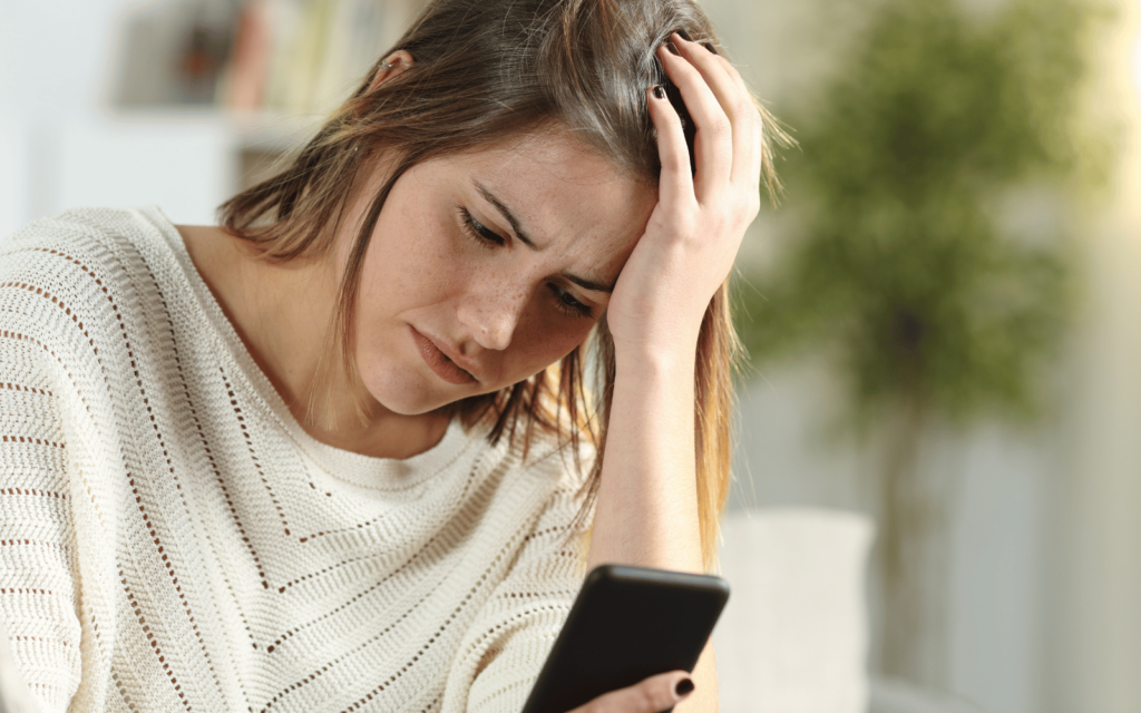 AI Anxiety (stock footage: woman looking at phone)