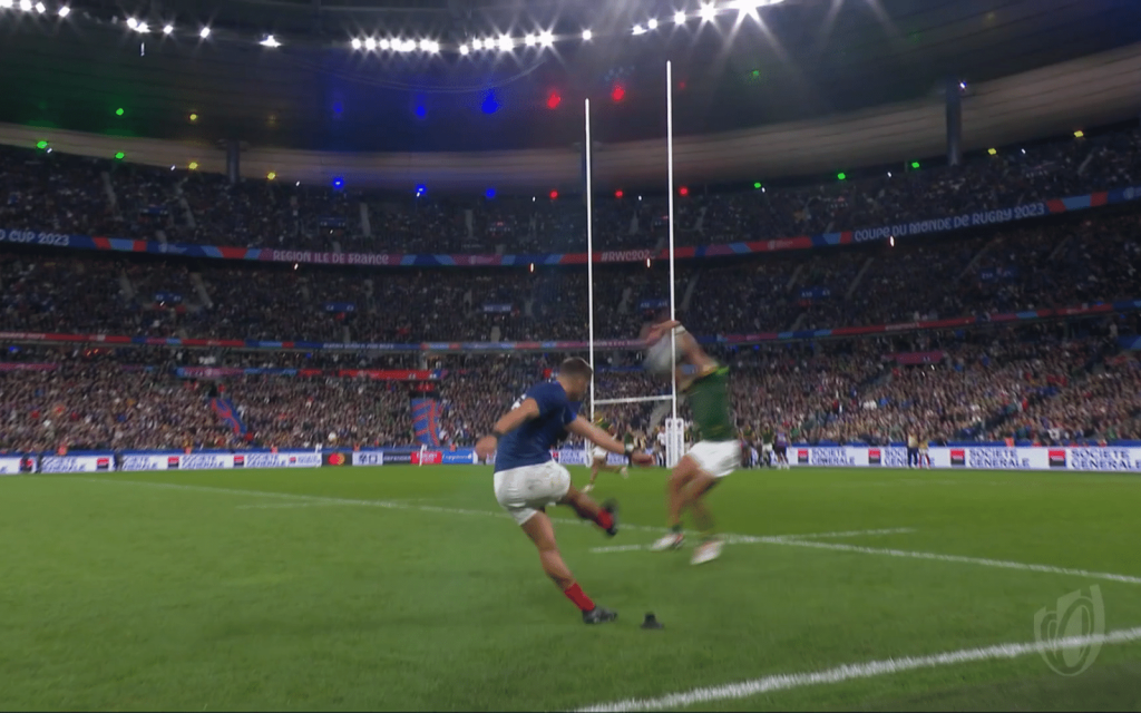 Cheslin Kolbe charges down the kick