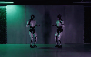 Why do some robots feel creepy? A university deliberately built one to find out Tesla Optimus robots dancing header (LS: E3)