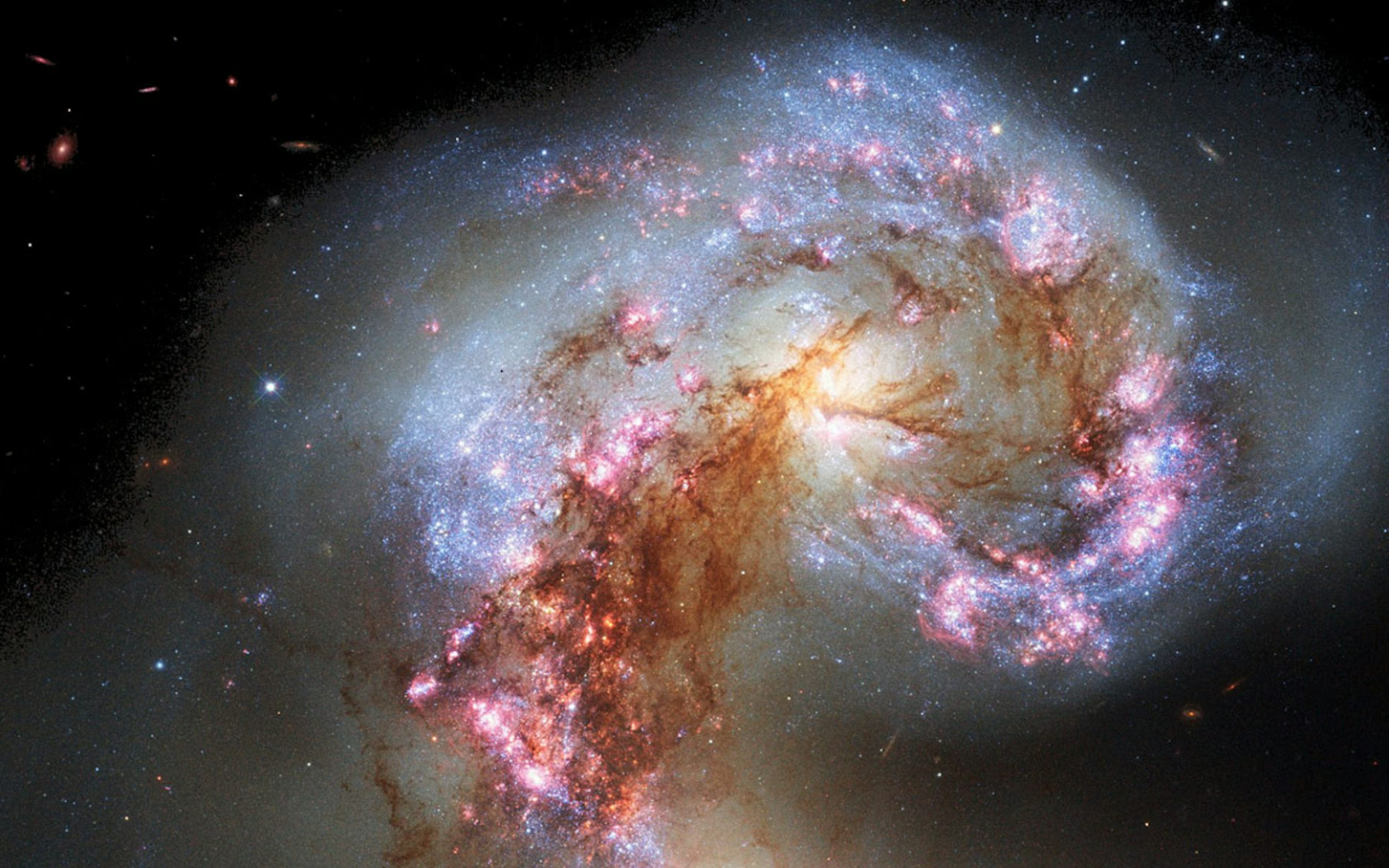 We’ve found an answer to the puzzle of how the largest galaxies formed Two galaxies — also known as NGC 4038 and NGC 4039