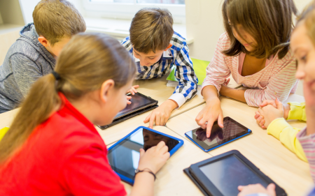 Kids using tablets (AI) header