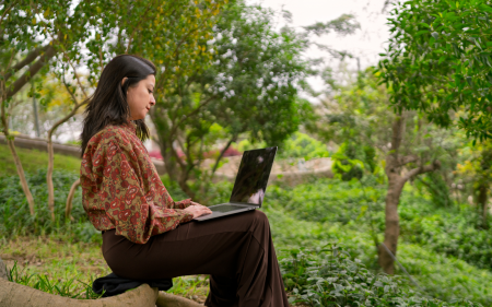 Laptop in nature header (digital)